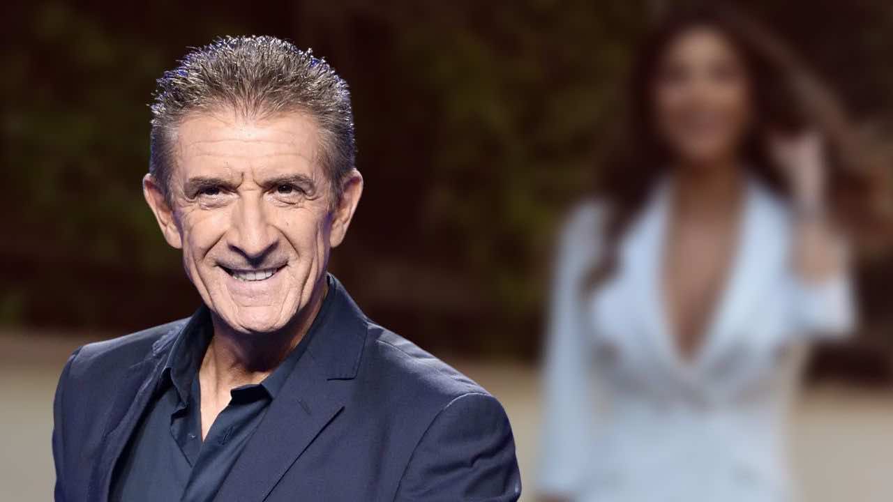 Ezio Greggio con la fidanzata (foto newsby, newsby)