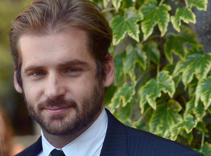 tomaso trussardi con una donna